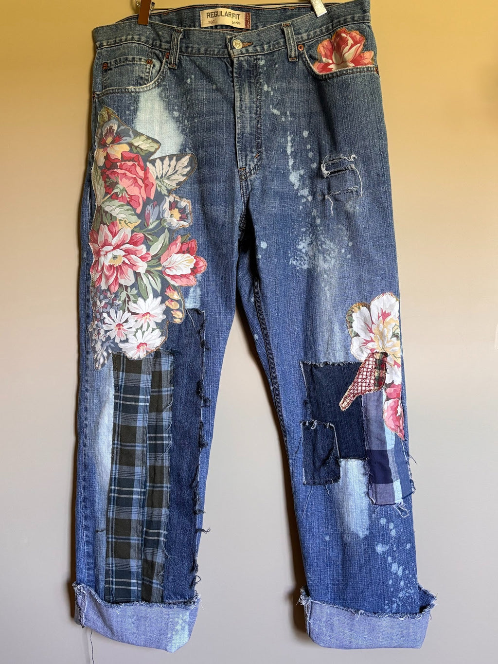 sewn patchwork on denim jeans